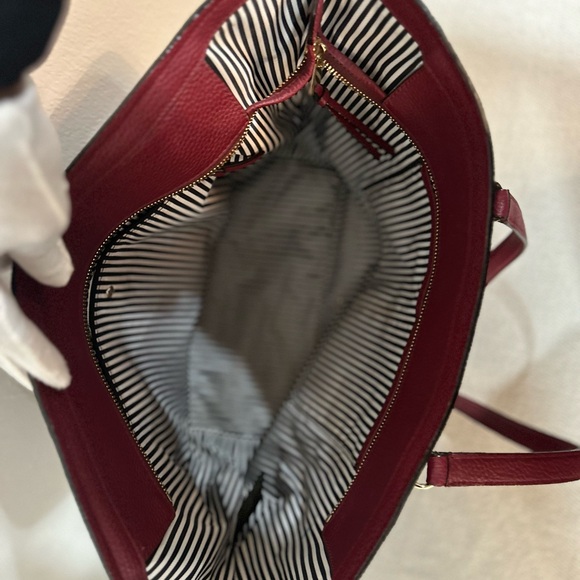 Beautiful burgundy large Kate spade tote bag with black and white interior. - Picture 3 of 3